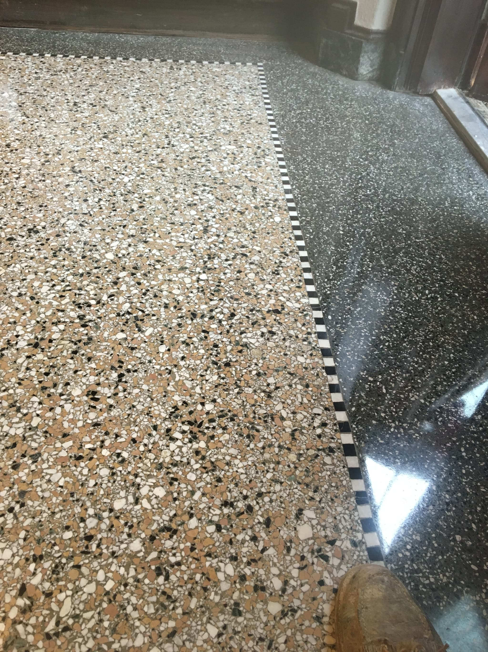 Terrazzo restoration and polishing showing diamond-polished aggregate finish at Fort Leavenworth