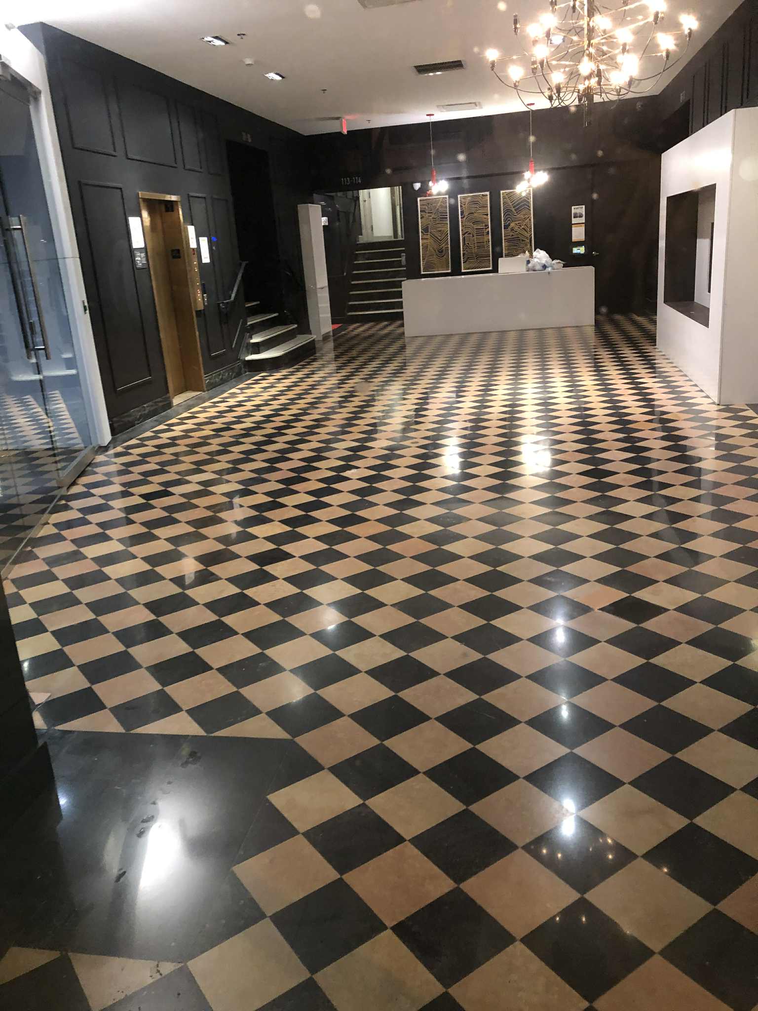 Polished marble floor with proper care and maintenance in Kansas City home