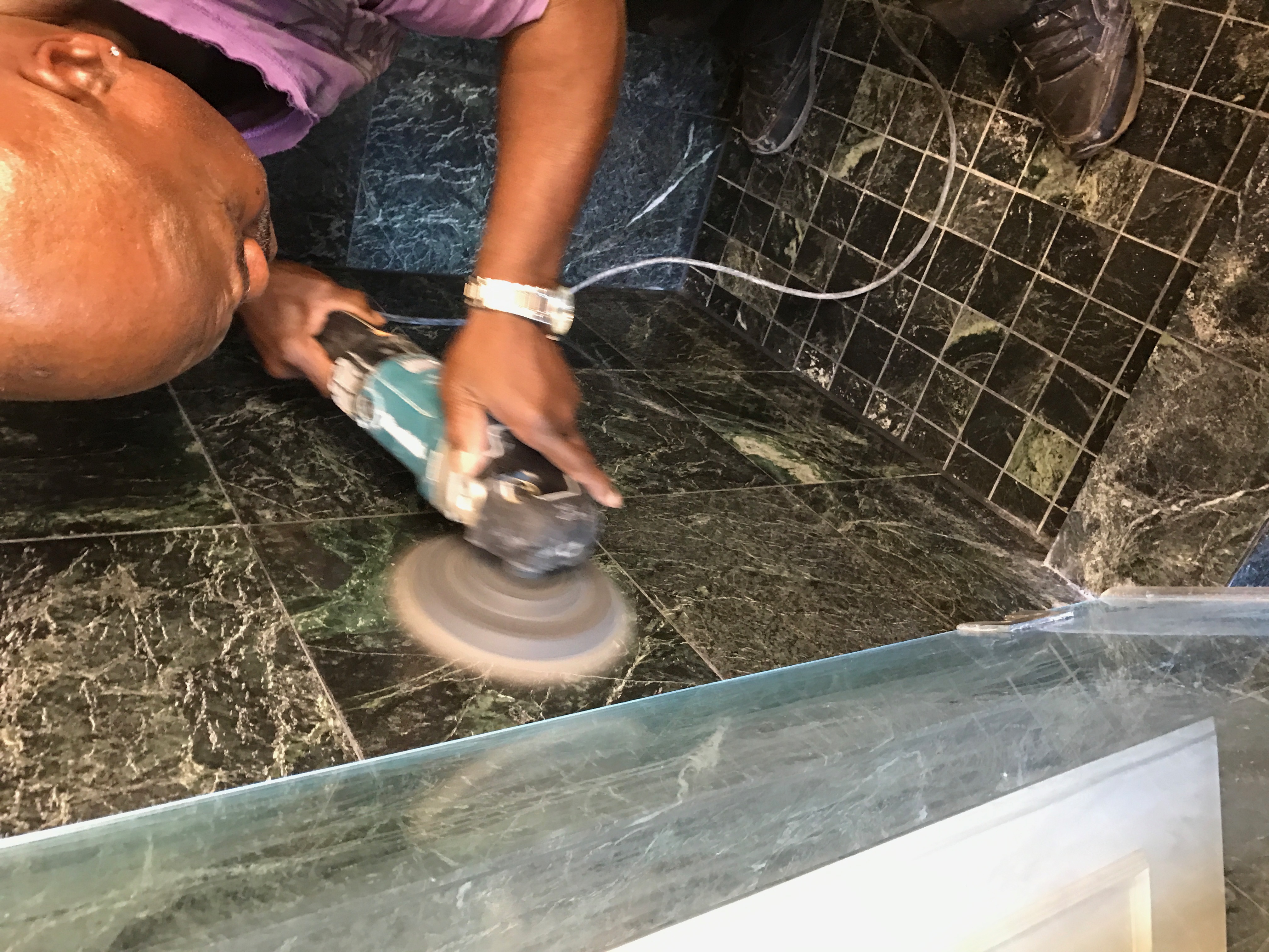 Professional grout cleaning showing before and after results